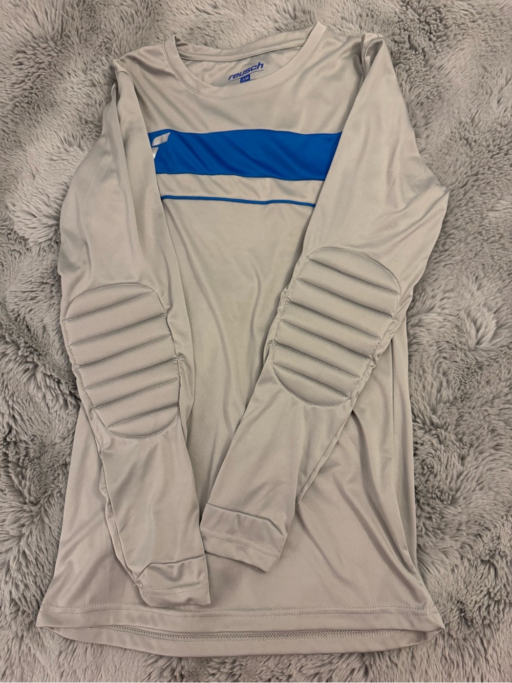 Reusch Long Sleeve Goalkeeper Jersey in Light Gray with Blue. Adult Medium